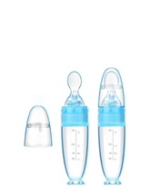 Squeeze spoon feeder